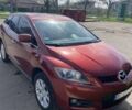 Красный Мазда СХ-7, объемом двигателя 2.26 л и пробегом 156 тыс. км за 6500 $, фото 1 на Automoto.ua