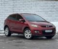 Красный Мазда СХ-7, объемом двигателя 2.3 л и пробегом 190 тыс. км за 6500 $, фото 1 на Automoto.ua