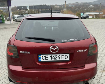 Красный Мазда СХ-7, объемом двигателя 2.26 л и пробегом 100 тыс. км за 5950 $, фото 9 на Automoto.ua