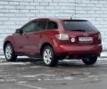 Красный Мазда СХ-7, объемом двигателя 2.3 л и пробегом 190 тыс. км за 6500 $, фото 3 на Automoto.ua