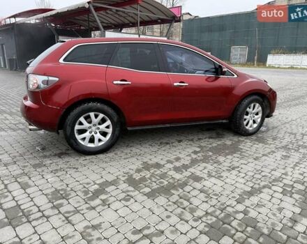 Красный Мазда СХ-7, объемом двигателя 2.3 л и пробегом 210 тыс. км за 4000 $, фото 1 на Automoto.ua