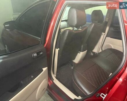 Красный Мазда СХ-7, объемом двигателя 2.26 л и пробегом 189 тыс. км за 7000 $, фото 2 на Automoto.ua