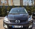 Красный Мазда СХ-7, объемом двигателя 2.3 л и пробегом 171 тыс. км за 6300 $, фото 1 на Automoto.ua
