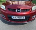 Красный Мазда СХ-7, объемом двигателя 2.3 л и пробегом 169 тыс. км за 5700 $, фото 1 на Automoto.ua