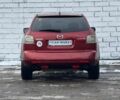 Красный Мазда СХ-7, объемом двигателя 2.3 л и пробегом 190 тыс. км за 6500 $, фото 4 на Automoto.ua