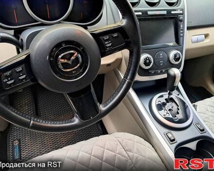 Красный Мазда СХ-7, объемом двигателя 2.3 л и пробегом 157 тыс. км за 6600 $, фото 11 на Automoto.ua