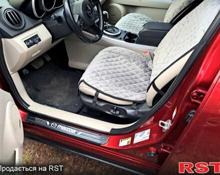 Красный Мазда СХ-7, объемом двигателя 2.3 л и пробегом 157 тыс. км за 6600 $, фото 10 на Automoto.ua