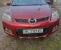 Красный Мазда СХ-7, объемом двигателя 2.3 л и пробегом 290 тыс. км за 5000 $, фото 1 на Automoto.ua