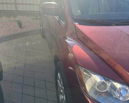 Красный Мазда СХ-7, объемом двигателя 2.3 л и пробегом 125 тыс. км за 6500 $, фото 11 на Automoto.ua