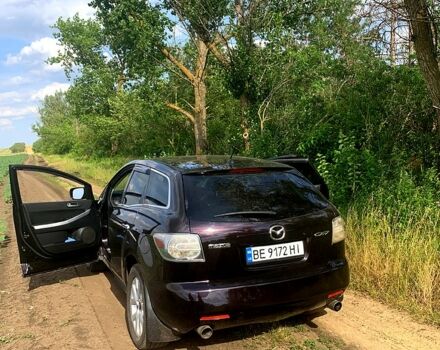 Красный Мазда СХ-7, объемом двигателя 2.3 л и пробегом 189 тыс. км за 7750 $, фото 1 на Automoto.ua