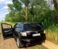 Красный Мазда СХ-7, объемом двигателя 2.3 л и пробегом 189 тыс. км за 7750 $, фото 1 на Automoto.ua