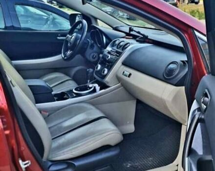 Красный Мазда СХ-7, объемом двигателя 2.3 л и пробегом 240 тыс. км за 7500 $, фото 1 на Automoto.ua