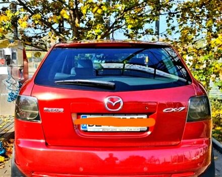 Красный Мазда СХ-7, объемом двигателя 2.3 л и пробегом 240 тыс. км за 7500 $, фото 2 на Automoto.ua
