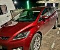 Красный Мазда СХ-7, объемом двигателя 2.3 л и пробегом 240 тыс. км за 7500 $, фото 1 на Automoto.ua