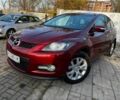 Красный Мазда СХ-7, объемом двигателя 2.3 л и пробегом 195 тыс. км за 7500 $, фото 1 на Automoto.ua