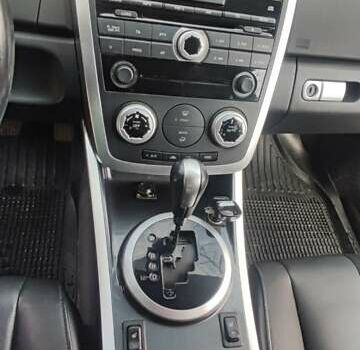 Красный Мазда СХ-7, объемом двигателя 2.3 л и пробегом 110 тыс. км за 5300 $, фото 12 на Automoto.ua