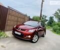 Красный Мазда СХ-7, объемом двигателя 2.3 л и пробегом 155 тыс. км за 8700 $, фото 1 на Automoto.ua