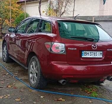 Красный Мазда СХ-7, объемом двигателя 2.3 л и пробегом 135 тыс. км за 7654 $, фото 3 на Automoto.ua