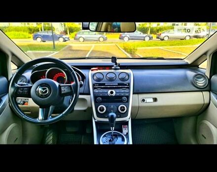 Красный Мазда СХ-7, объемом двигателя 2.3 л и пробегом 240 тыс. км за 7500 $, фото 5 на Automoto.ua