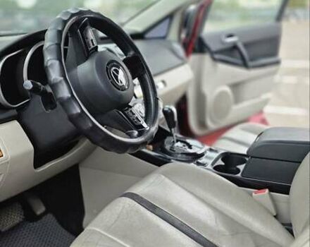 Червоний Мазда СХ-7, об'ємом двигуна 2.26 л та пробігом 171 тис. км за 7400 $, фото 13 на Automoto.ua