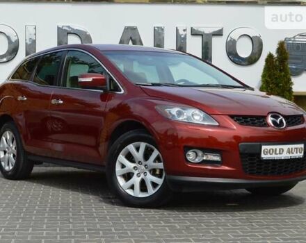 Красный Мазда СХ-7, объемом двигателя 2.26 л и пробегом 159 тыс. км за 7500 $, фото 1 на Automoto.ua