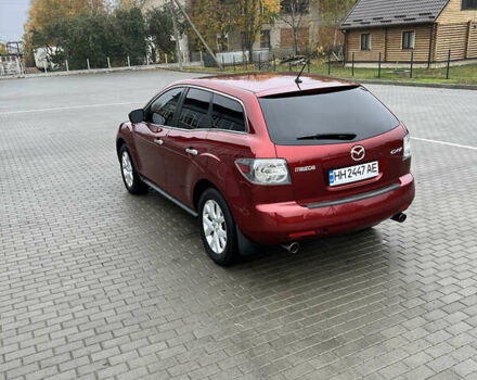 Красный Мазда СХ-7, объемом двигателя 2.26 л и пробегом 74 тыс. км за 7950 $, фото 5 на Automoto.ua