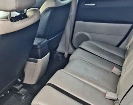 Красный Мазда СХ-7, объемом двигателя 2.3 л и пробегом 240 тыс. км за 7500 $, фото 2 на Automoto.ua