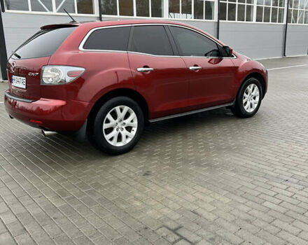 Красный Мазда СХ-7, объемом двигателя 2.26 л и пробегом 74 тыс. км за 7950 $, фото 12 на Automoto.ua