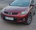Красный Мазда СХ-7, объемом двигателя 2.3 л и пробегом 192 тыс. км за 6300 $, фото 1 на Automoto.ua