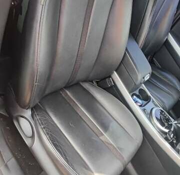 Красный Мазда СХ-7, объемом двигателя 2.3 л и пробегом 110 тыс. км за 5300 $, фото 6 на Automoto.ua