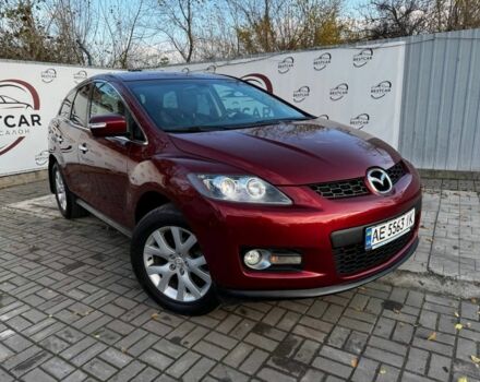 Красный Мазда СХ-7, объемом двигателя 2.3 л и пробегом 195 тыс. км за 7500 $, фото 1 на Automoto.ua