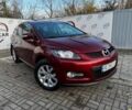Красный Мазда СХ-7, объемом двигателя 2.3 л и пробегом 195 тыс. км за 7500 $, фото 1 на Automoto.ua