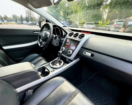 Красный Мазда СХ-7, объемом двигателя 2.3 л и пробегом 195 тыс. км за 8000 $, фото 1 на Automoto.ua