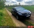 Красный Мазда СХ-7, объемом двигателя 2.3 л и пробегом 189 тыс. км за 7750 $, фото 3 на Automoto.ua