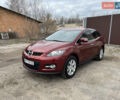 Красный Мазда СХ-7, объемом двигателя 2.3 л и пробегом 156 тыс. км за 6100 $, фото 1 на Automoto.ua