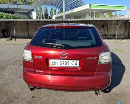 Красный Мазда СХ-7, объемом двигателя 2.3 л и пробегом 110 тыс. км за 7800 $, фото 1 на Automoto.ua