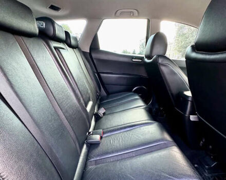 Красный Мазда СХ-7, объемом двигателя 2.3 л и пробегом 195 тыс. км за 8000 $, фото 2 на Automoto.ua