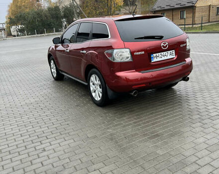 Красный Мазда СХ-7, объемом двигателя 2.26 л и пробегом 74 тыс. км за 7950 $, фото 4 на Automoto.ua