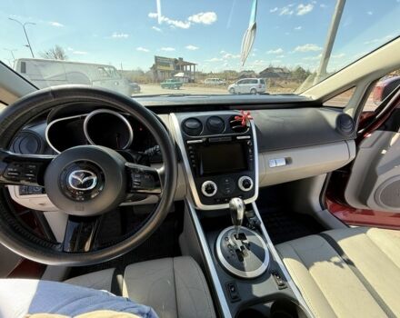 Красный Мазда СХ-7, объемом двигателя 2.3 л и пробегом 157 тыс. км за 7500 $, фото 1 на Automoto.ua