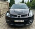 Красный Мазда СХ-7, объемом двигателя 2.3 л и пробегом 198 тыс. км за 7322 $, фото 1 на Automoto.ua