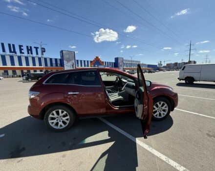 Красный Мазда СХ-7, объемом двигателя 2.3 л и пробегом 157 тыс. км за 7500 $, фото 3 на Automoto.ua