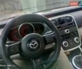 Красный Мазда СХ-7, объемом двигателя 2.3 л и пробегом 236 тыс. км за 4999 $, фото 1 на Automoto.ua