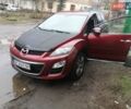 Красный Мазда СХ-7, объемом двигателя 2.2 л и пробегом 254 тыс. км за 7900 $, фото 1 на Automoto.ua