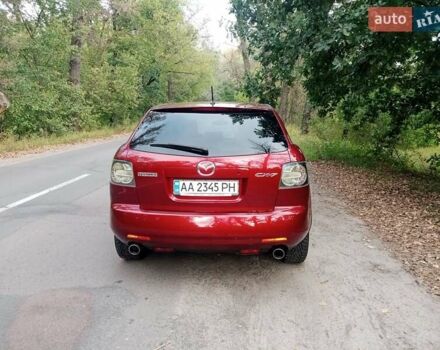 Красный Мазда СХ-7, объемом двигателя 2.26 л и пробегом 165 тыс. км за 8300 $, фото 11 на Automoto.ua