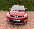 Красный Мазда СХ-7, объемом двигателя 2.3 л и пробегом 311 тыс. км за 4500 $, фото 1 на Automoto.ua