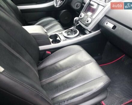 Красный Мазда СХ-7, объемом двигателя 2.26 л и пробегом 165 тыс. км за 8300 $, фото 1 на Automoto.ua