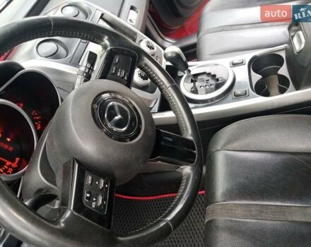 Красный Мазда СХ-7, объемом двигателя 2.26 л и пробегом 165 тыс. км за 8300 $, фото 9 на Automoto.ua