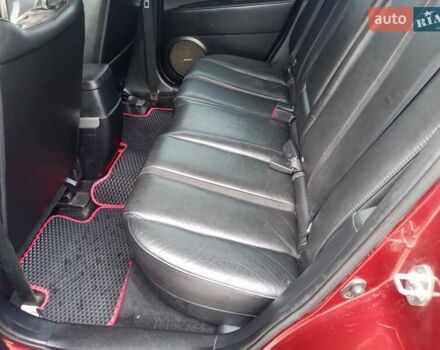 Красный Мазда СХ-7, объемом двигателя 2.26 л и пробегом 165 тыс. км за 8300 $, фото 3 на Automoto.ua