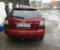 Красный Мазда СХ-7, объемом двигателя 2.2 л и пробегом 254 тыс. км за 7900 $, фото 1 на Automoto.ua