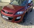 Красный Мазда СХ-7, объемом двигателя 2.2 л и пробегом 125 тыс. км за 7400 $, фото 1 на Automoto.ua